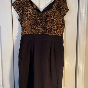 Black and cheetah dress with side zipper, button in back, and bow.